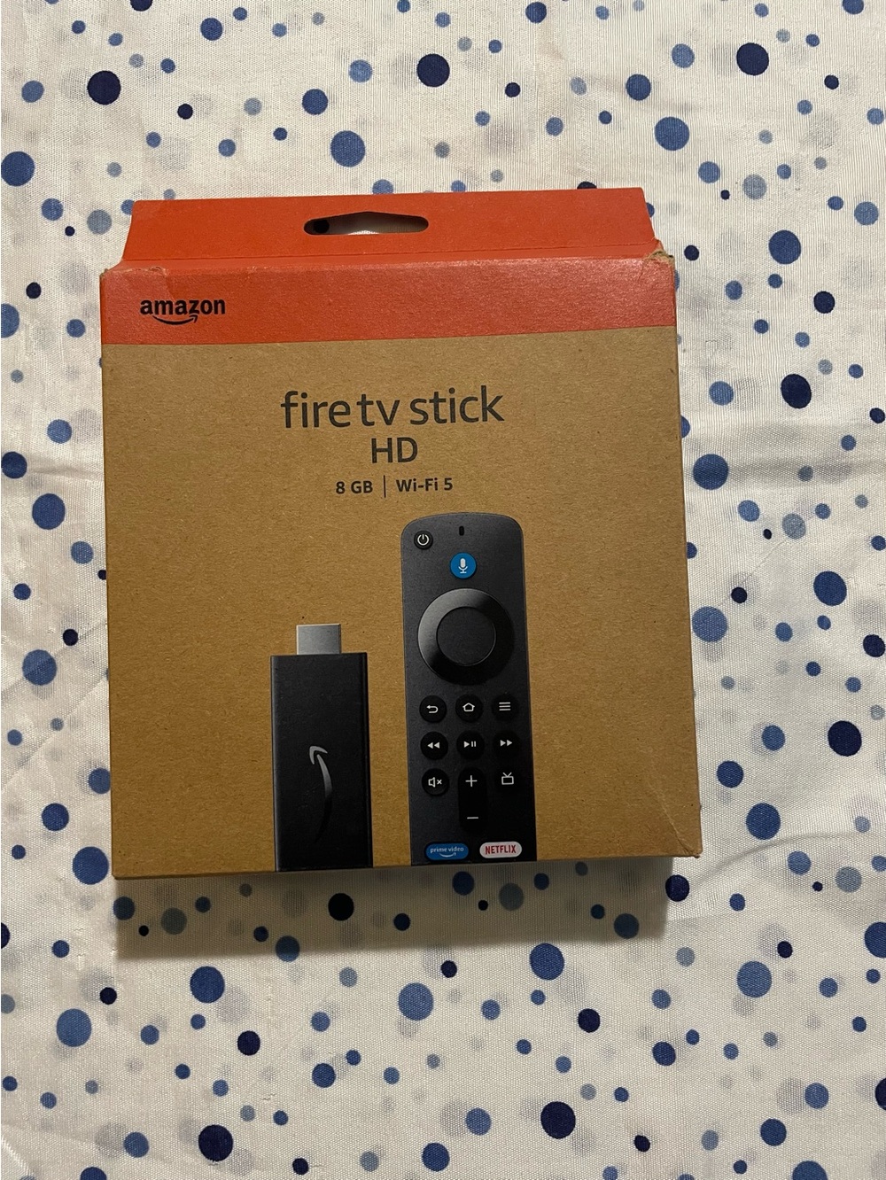Amazon Streaming Device Packaging — Black Logos on Brown Box with Orange Top